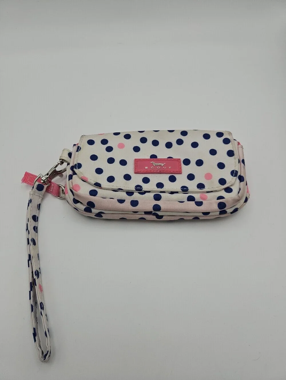 Scout white wristlet with blue polka dots and pin accents